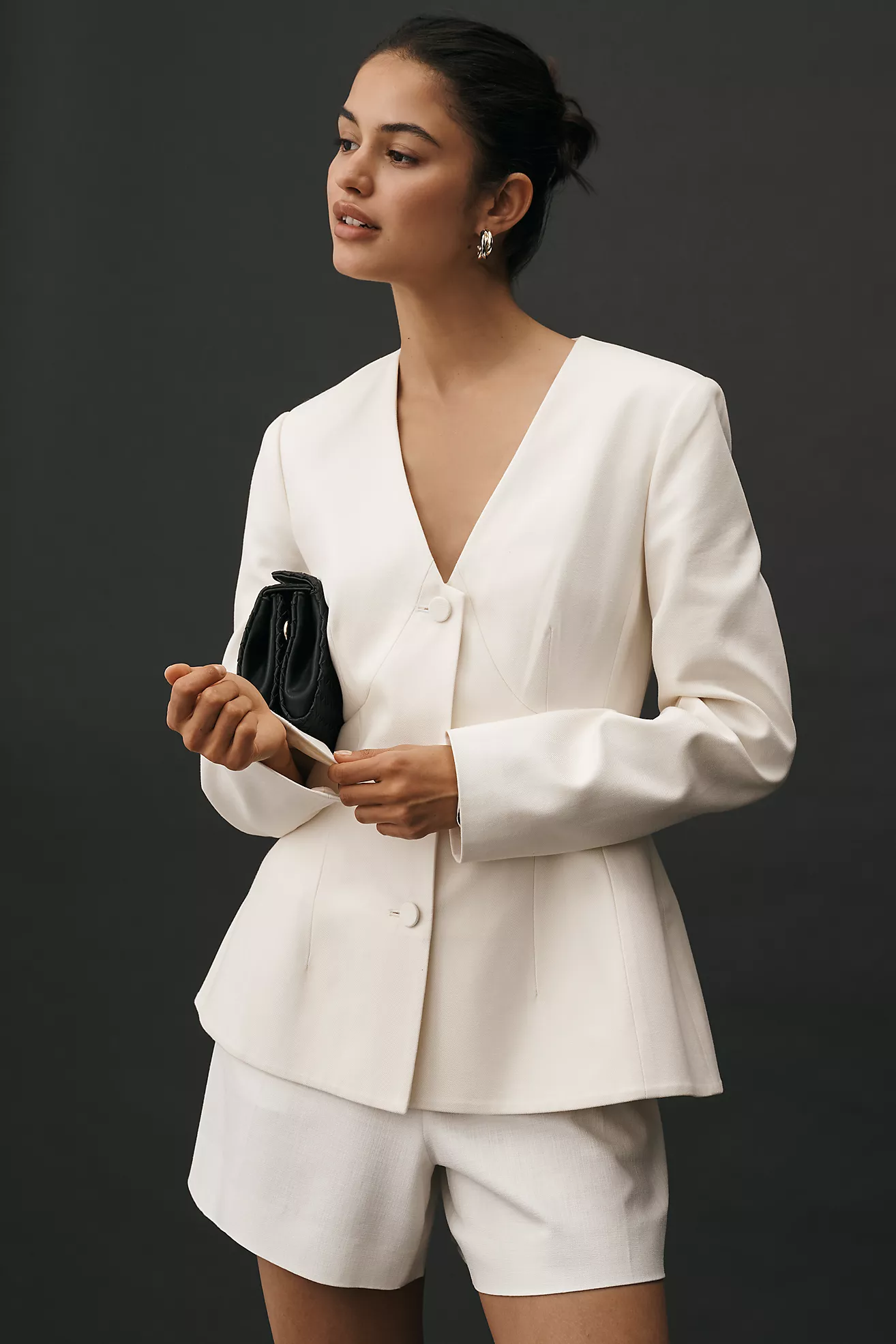 Blazer con escote profundo y diseño péplum de Mare Mare