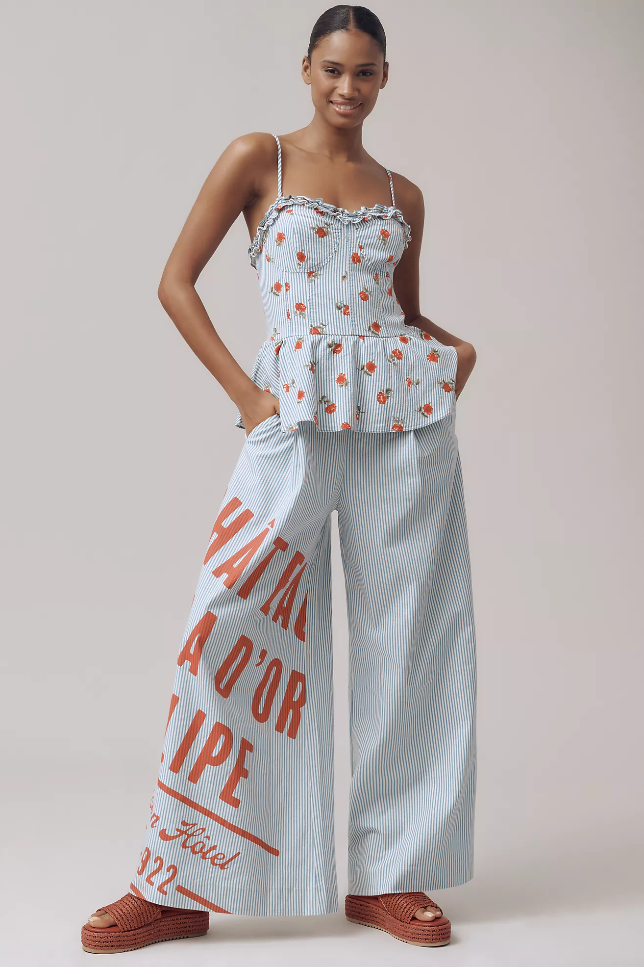 Mono sin mangas de lino con pierna ancha y detalle péplum