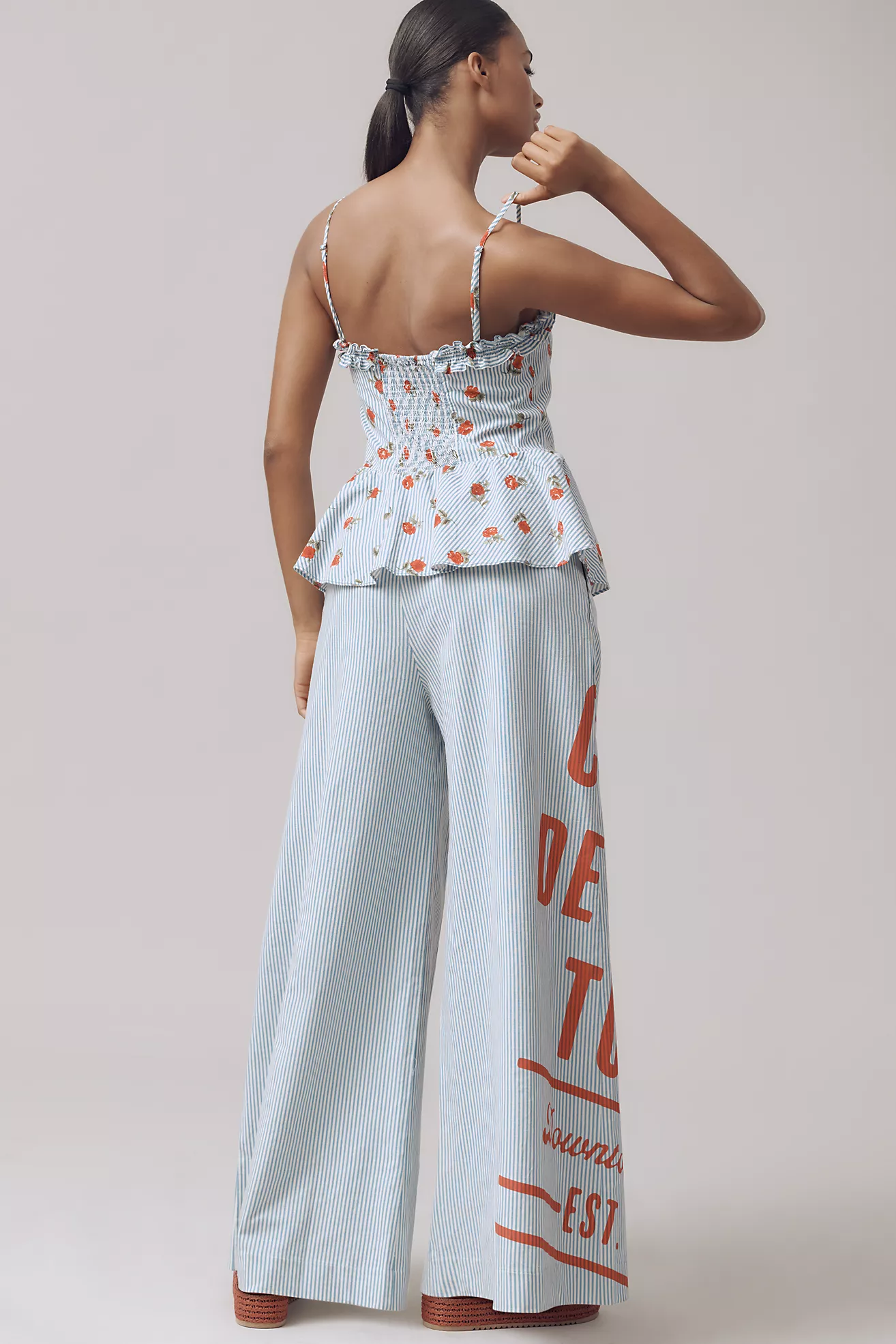 Mono sin mangas de lino con pierna ancha y detalle péplum - Imagen 2